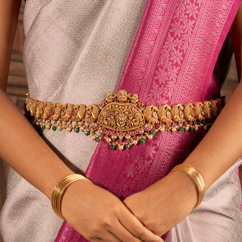 Authentic 925 silver kundan oddiyanam and gold plated vaddanams.Original stones, rubies, pearls with handcrafted detailing.Explore traditional bridal waist belts at Vilva.