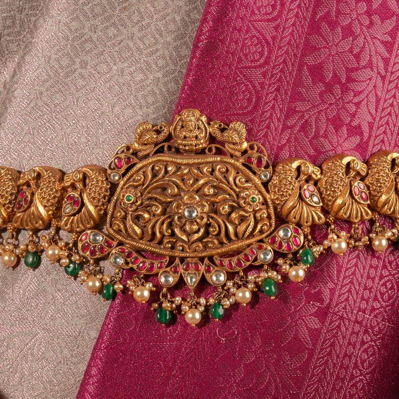 Authentic 925 silver kundan oddiyanam and gold plated vaddanams.Original stones, rubies, pearls with handcrafted detailing.Explore traditional bridal waist belts at Vilva.